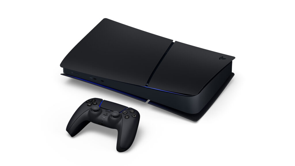 PS5 Digital Edition noire posée à plat avec une manette DualSense noire