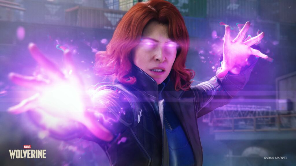 Jean Grey, les yeux et les mains illuminés de violet, déploie sa télékinésie